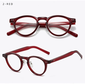 Detail view of wine red TR90 round eyeglasses frame with metal rivets and temple model specs