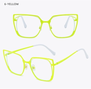 Detail view of yellow cat eye glasses frames with hollowed out stylish temple design