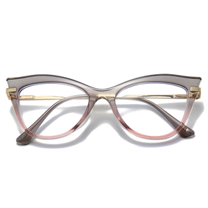 Blaulichtfilter-Brille in Katzenaugenform mit grau-rosa Farbverlauf und goldenen Metallbügeln