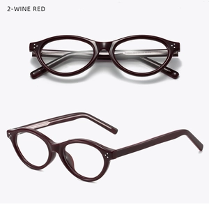 Detailed close-up of wine red retro round frames with silver three-dot rivet accents