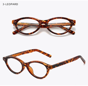 Detail of vintage leopard print oval eyewear frames with blue light blocking lenses
