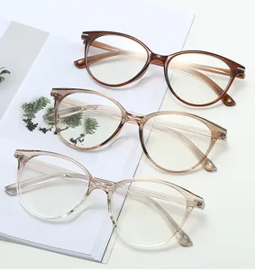 Detailed macro view of lightweight TR90 optical frames in brown and clear finishes