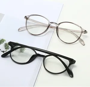 Detail view of TR90 round frame glasses showing the inner temple hinges and CE marking