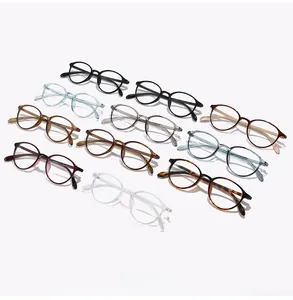 Detailed flat lay of ultra-light retro round TR90 glasses frames in various assorted colors