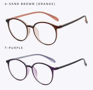 Detail view of round Boston frames in translucent sand brown and purple resin colors