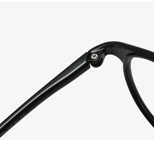 Detail of metal hinge on black eyewear frame with CE certification and 145 size mark