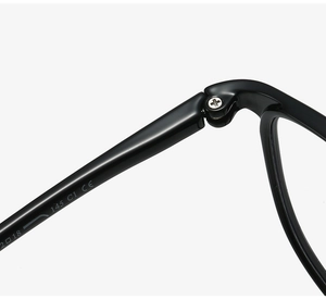 Detailed macro view of reinforced metal hinge and size specifications on TR90 glasses