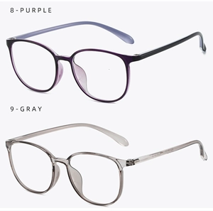 Detail view of round TR90 eyewear frames in purple-black and translucent gray colors
