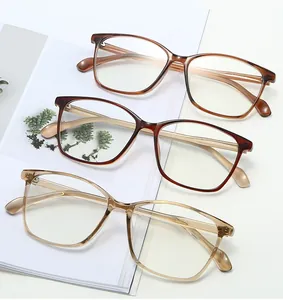 Close-up of TR90 square eyeglass frames in tortoise, burgundy, and transparent champagne