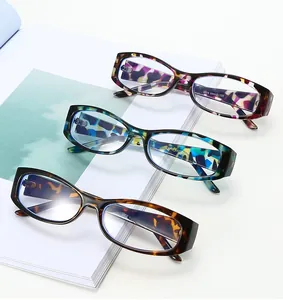 Detailed view of floral and tortoise shell patterned rectangular eyeglass frames for women