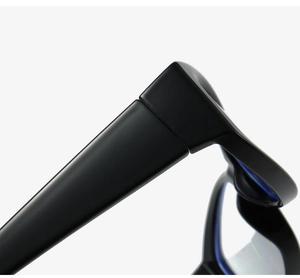 Detail shot of sturdy reinforced metal hinges on black acetate eyeglass frames