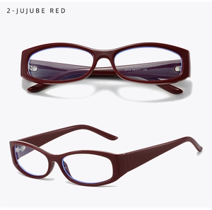 Detailed macro view of jujube red eyeglass frames with temple size specifications