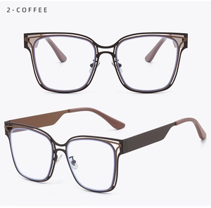 Detail view of coffee-colored hollow square metal frame glasses with blue light lenses