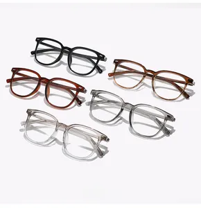 Top view of five lightweight TR90 optical frames in assorted colors on white background
