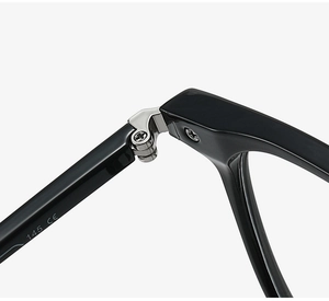 Macro detail of high-quality silver hinges and CE marking on black TR90 eyewear frames