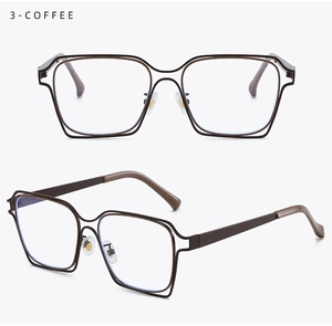 Detail view of double-layer coffee metal frame glasses with hollow oversized rectangle design