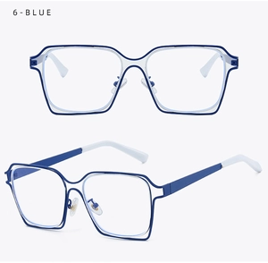 Detail view of large navy blue square glasses frame with contrasting white temples