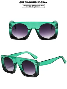 Detailed view of square flat top sunglasses with transparent green frames and gray lenses