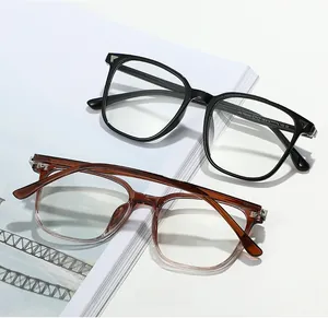 Close-up of TR8066 square glasses frames with metal arrow details on a bright white surface