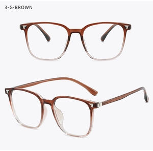 Detail of square brown gradient glasses frame with silver triangle metal accents