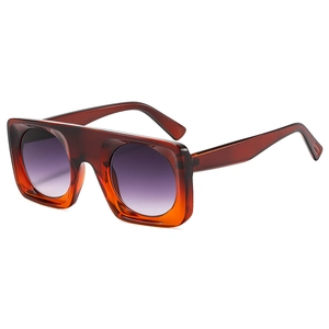 Oversized square sunglasses with gradient purple lenses and a trendy flat top frame