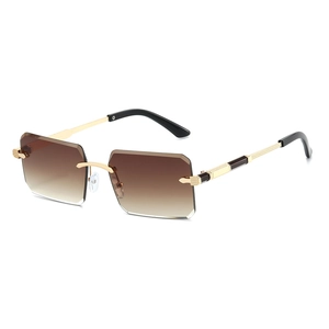 Frameless brown gradient sunglasses with gold metal temples and rectangle rimless lenses