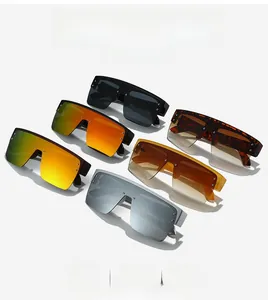 Collection of oversized square sunglasses in black, orange, and tortoiseshell frames