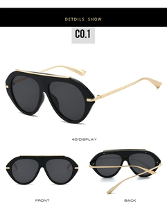 Three-view detail of oversized black pilot sunglasses with gold metal temples
