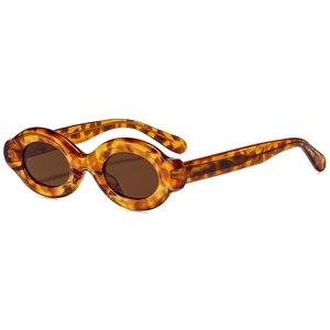 Vintage oval tortoiseshell sunglasses with dark brown lenses for a retro fashion look