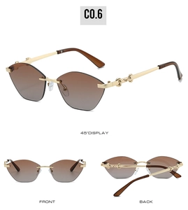 Multi-angle views of rimless cat-eye sunglasses with gradient lenses and gold metal temples