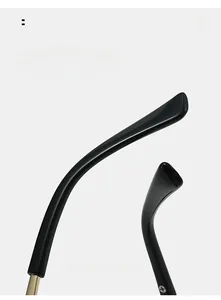 Detail of sleek black curved mirror legs for comfortable wear on cat eye sunglasses