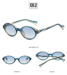 Detail view of oval blue sunglasses with gradient lenses and gold core hinge pins