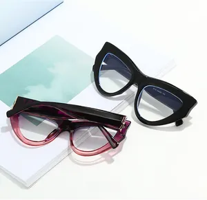 Detail view of cat-eye frames showing the 5716 model engraving and stylish gradients