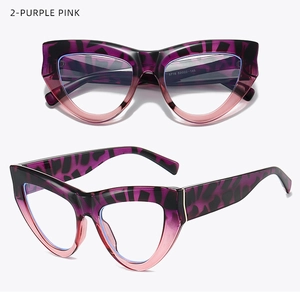 Detail view of purple pink cat eye frames with wide temples and leopard pattern design