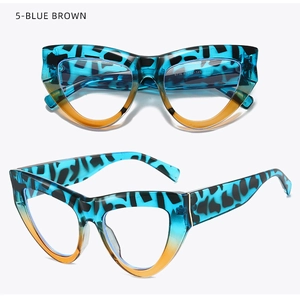 Detail of cat-eye frames with blue leopard print and brown gradient finish