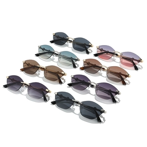 Nine pairs of trendy rimless cat-eye sunglasses with colorful geometric lenses and gold frames