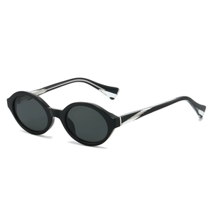 Retro oval sunglasses with glossy black frame and silver striped arms for women