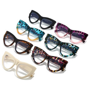 Collection of oversized cat eye glasses frames in various colors with anti-blue light lenses