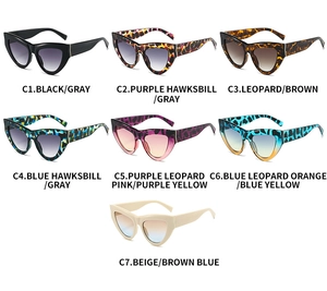 Détails de lunettes de soleil œil de chat triangulaires en sept coloris différents