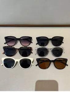 Flat lay of vintage round sunglasses in six various colors and patterns with metal accents