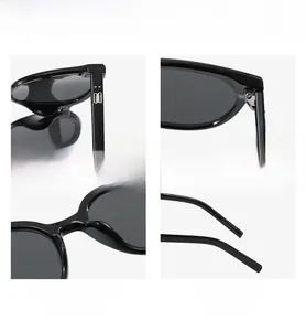 Macro detail of black square sunglasses featuring metal hinges and integrated nose pads