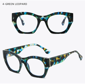 Detail view of vintage cat-eye glasses frame in green leopard acetate finish