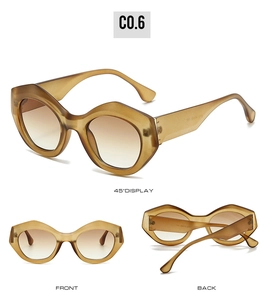 Detailansicht der bernsteinfarbenen Cat-Eye-Sonnenbrille mit braunen Verlaufsgläsern