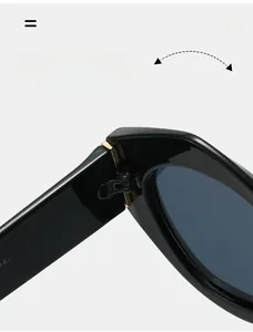 Details des robusten Goldmetallscharfiers an schwarzen Katzenaugen-Sonnenbrillen