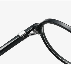 Detail of durable metal hinge on black TR90 frames with 45 CE markings on temple