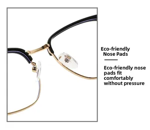 Detailed macro view of eco-friendly nose pads on retro black and gold semi-rimless frames