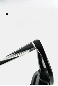 Macro detail of cat-eye sunglasses featuring metal core hinge and lightweight frame