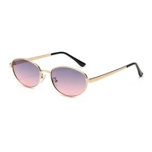 Gafas de sol cat eye con montura de metal dorado y lentes degradadas de púrpura a rosa