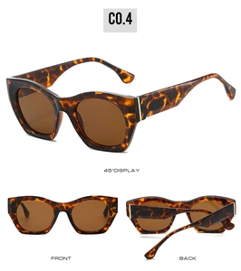 Detailed views of vintage tortoiseshell cat-eye sunglasses with dark brown lenses