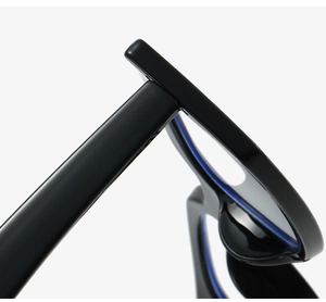 Macro shot of durable metal hinges and polished black frame on square sunglasses